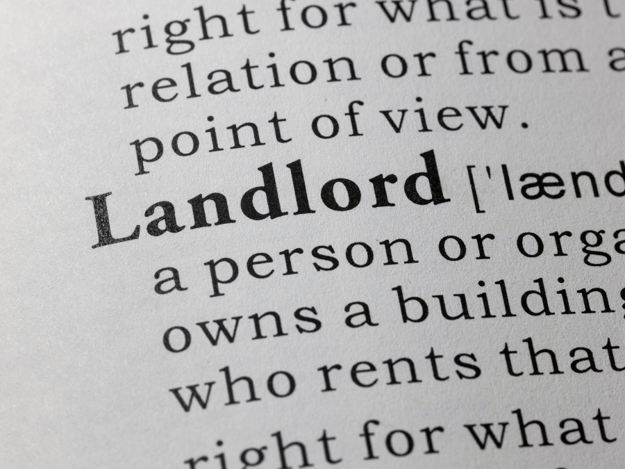 Close-up view of a dictionary entry for the word "Landlord," showing the word's definition and pronunciation guide.