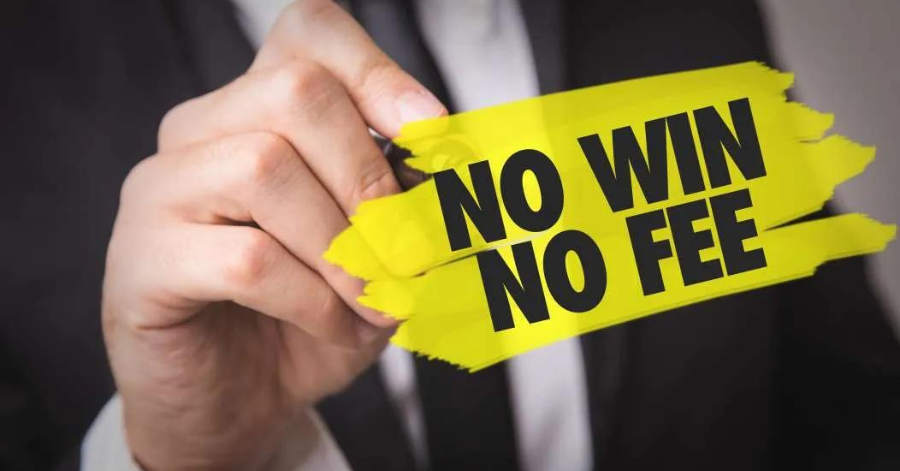 A person in a suit holds a marker with the text "NO WIN NO FEE" written in bold black letters on a yellow background.